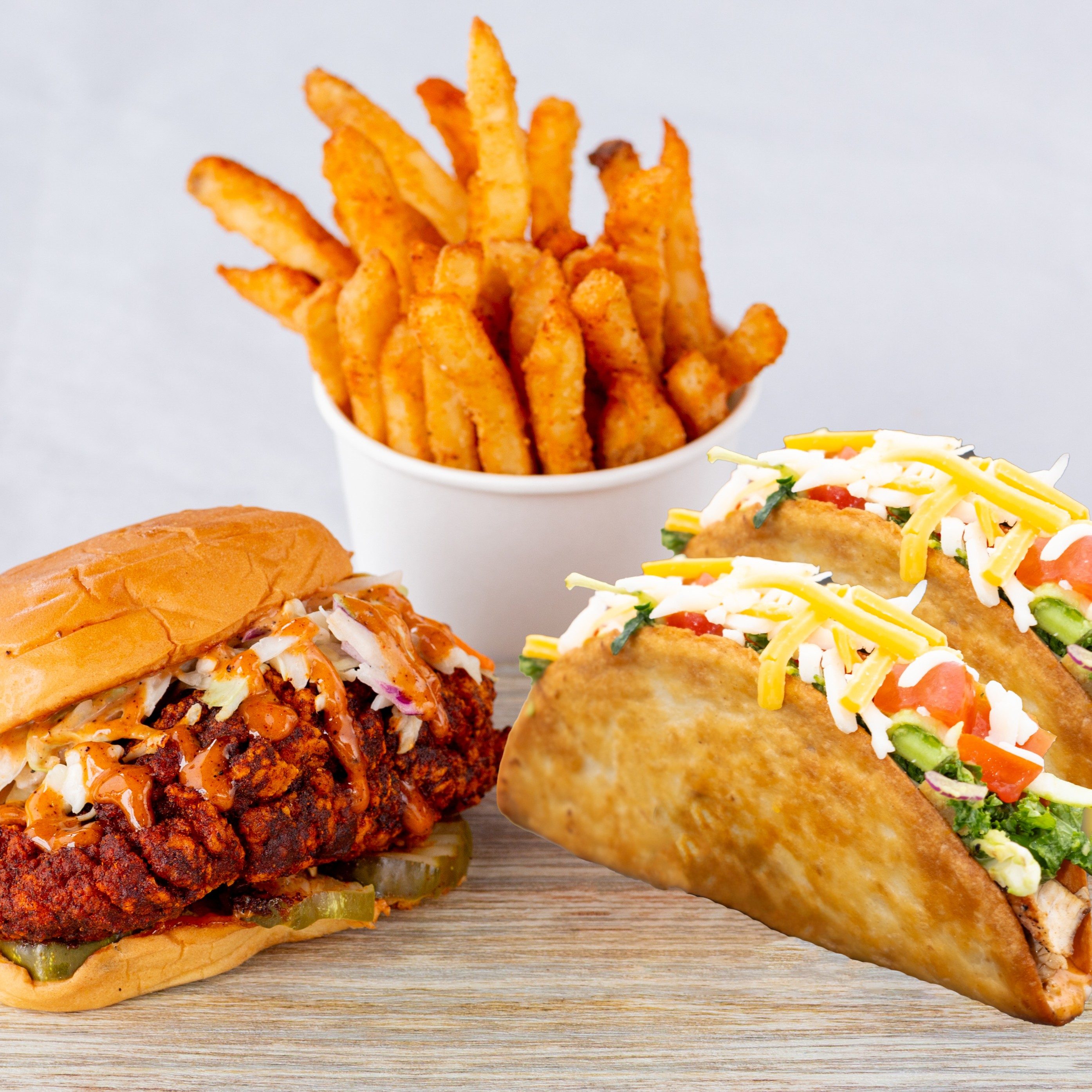 Chicken Sando and Two Crunchy Tacos with fries.