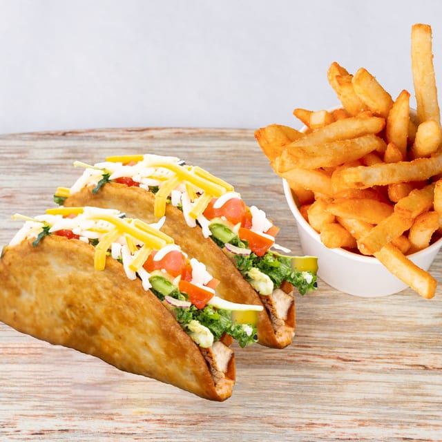 Two Crunchy Tacos with fries.