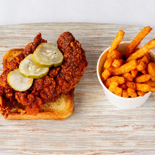 Two tenders tenders with fries.